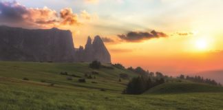 Schlern mountain with pasture at sunset, South Tyrol, Italy