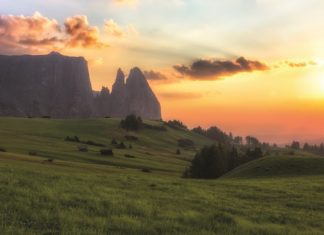 Schlern mountain with pasture at sunset, South Tyrol, Italy