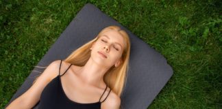 The,Girl,Lies,With,Her,Eyes,Closed,,On,A,Yoga