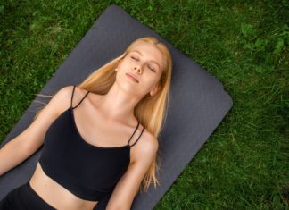 The,Girl,Lies,With,Her,Eyes,Closed,,On,A,Yoga