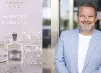 Die NOBILIS GROUP erwirkt einstweilige Verfügung gegen den Duftzwillings-Anbieter LORIS Links ein Parfumflakon und rechts ein Mann in hellblauem Blazer, der in die Kamera lächelt.