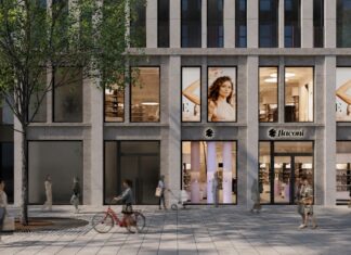 flaconi startet mit „Beauty Now“ Entwurf einer Ladenfront. Im Vordergrund ein großer Platz mit Passanten.